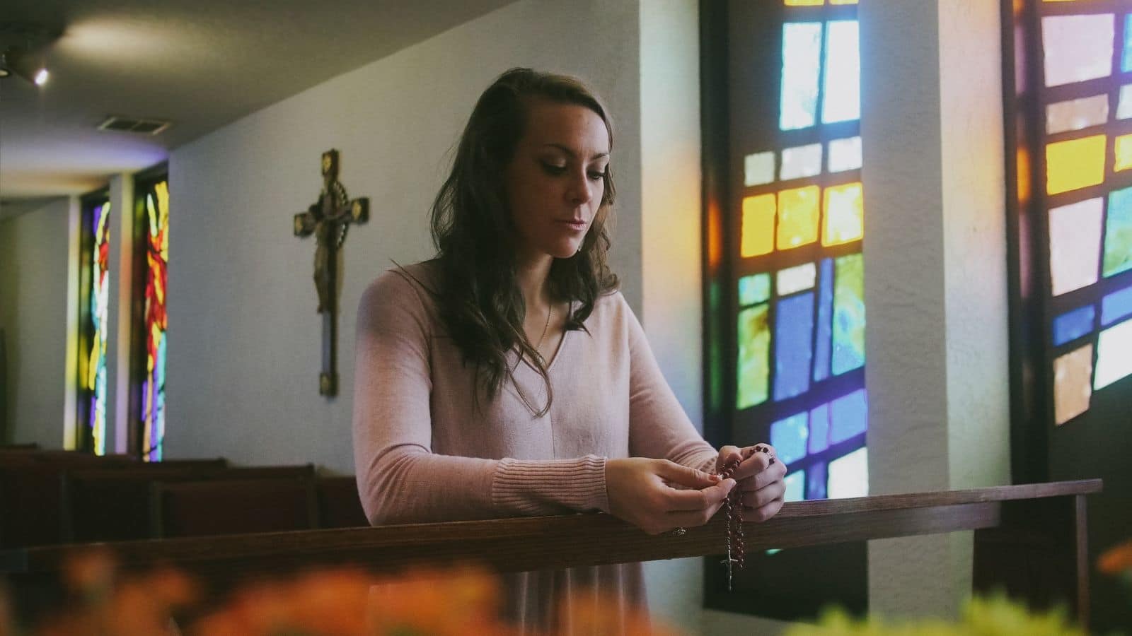 woman praying in church