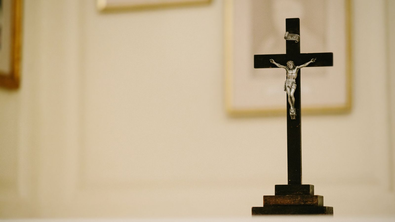 wooden crucifix on table