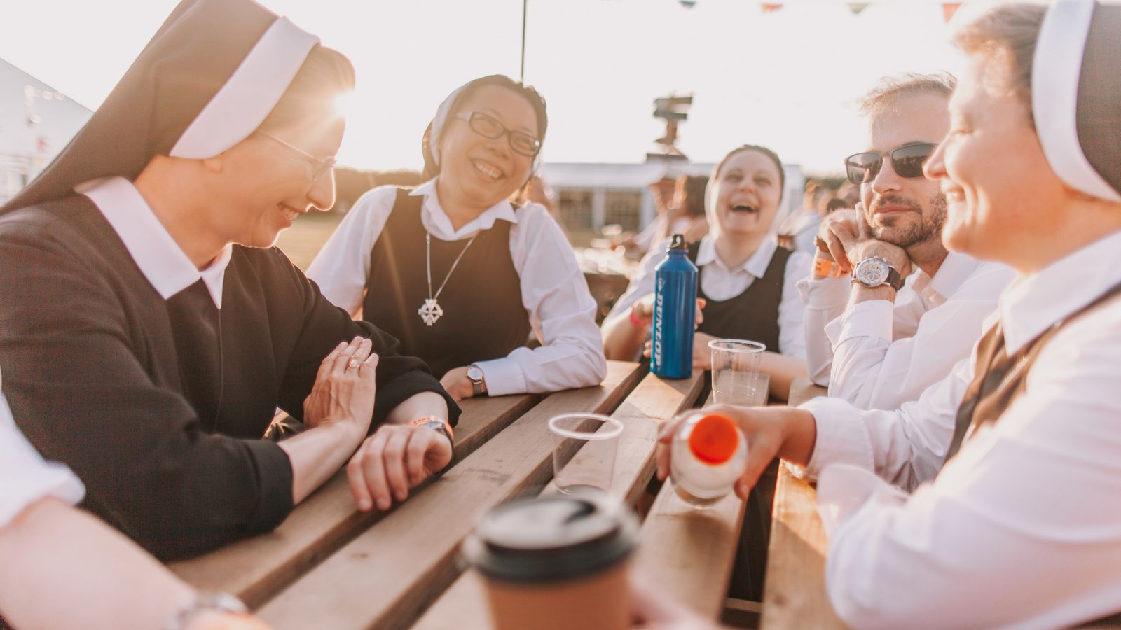 Catholic Nuns sitting around a table