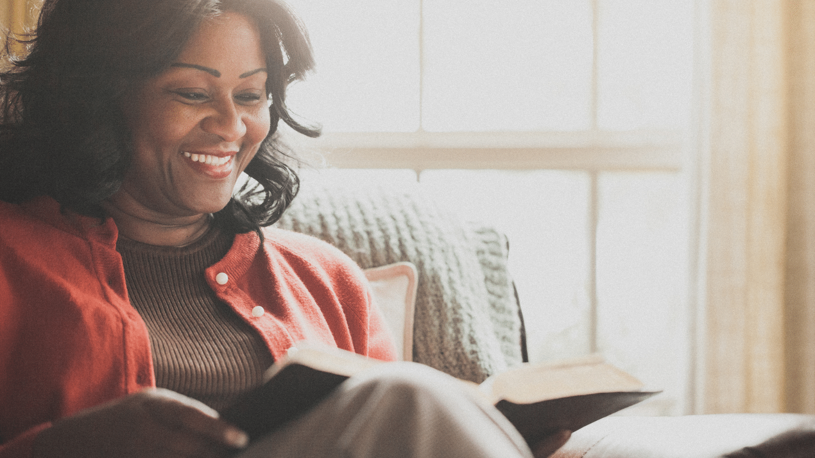 African American woman reading her Bible