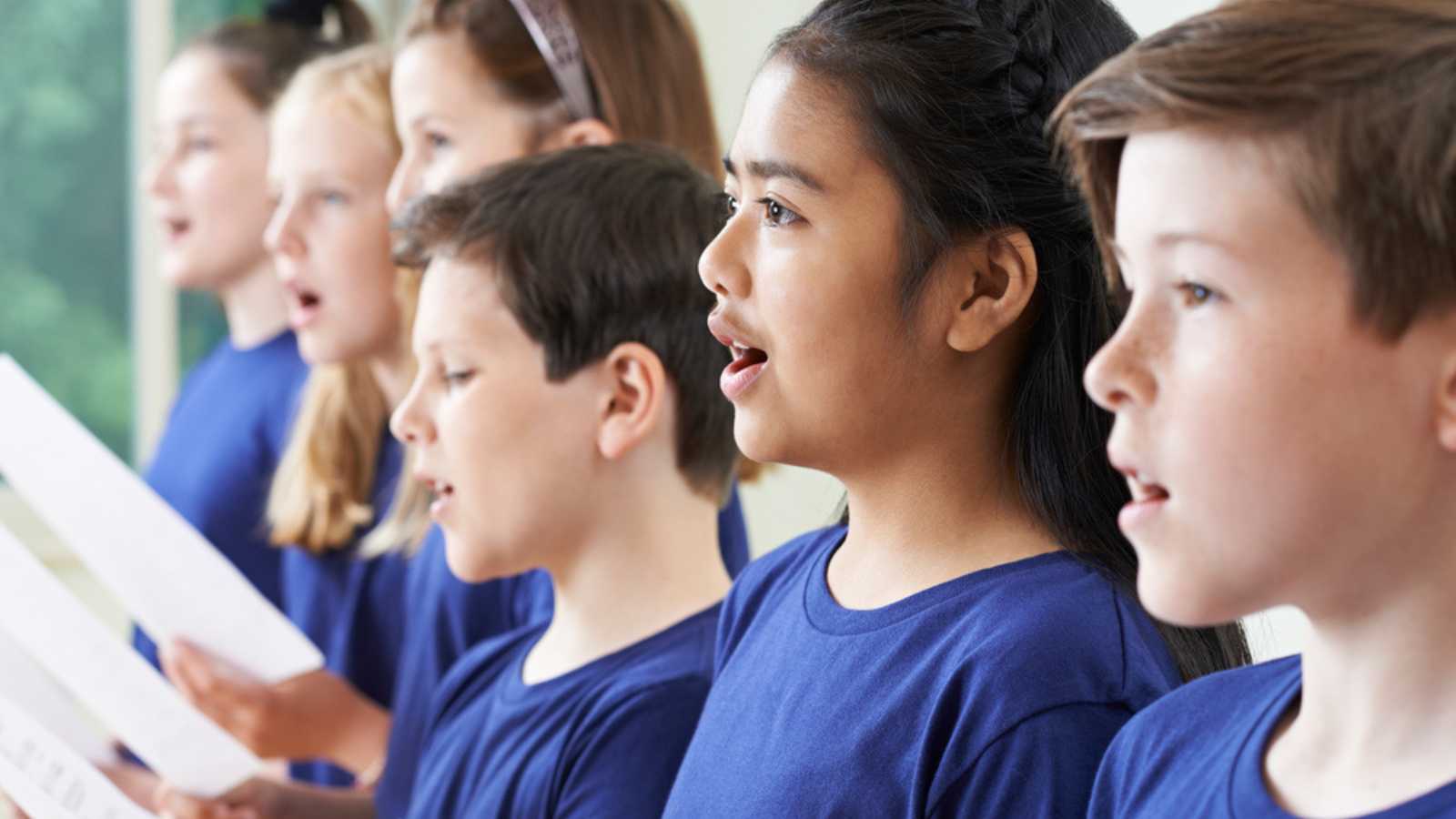 School kids singing at church