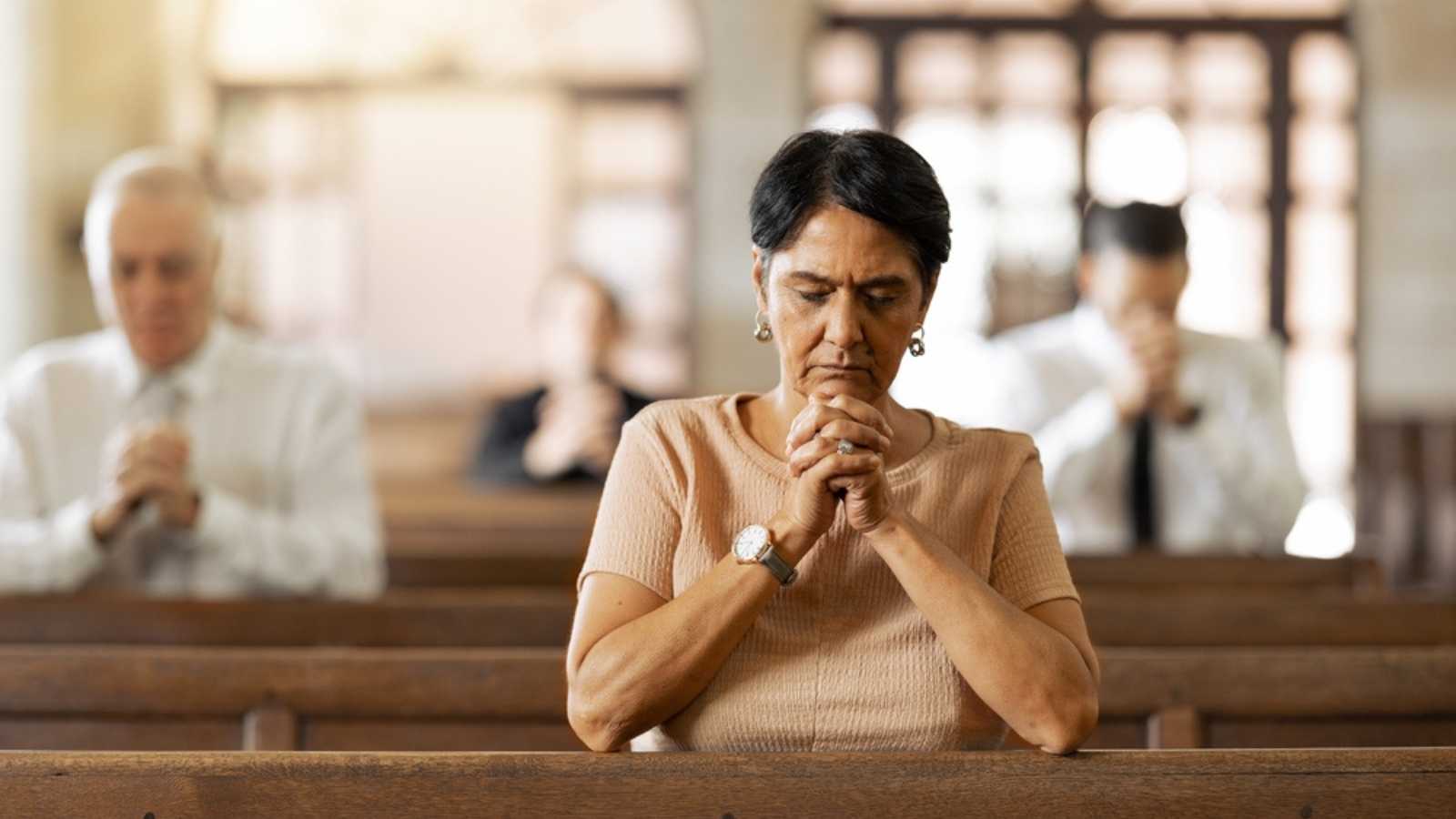Woman listening to prayer