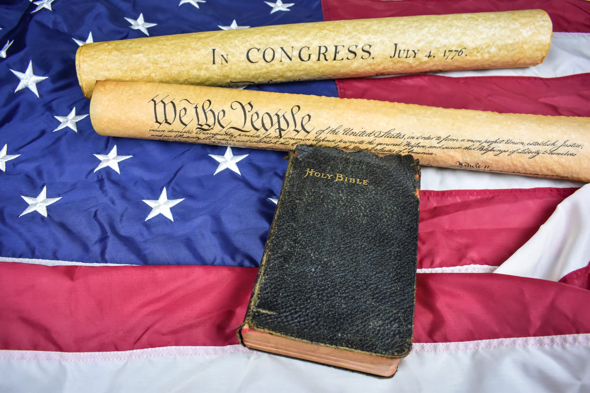 Bible with American flag and Constitution