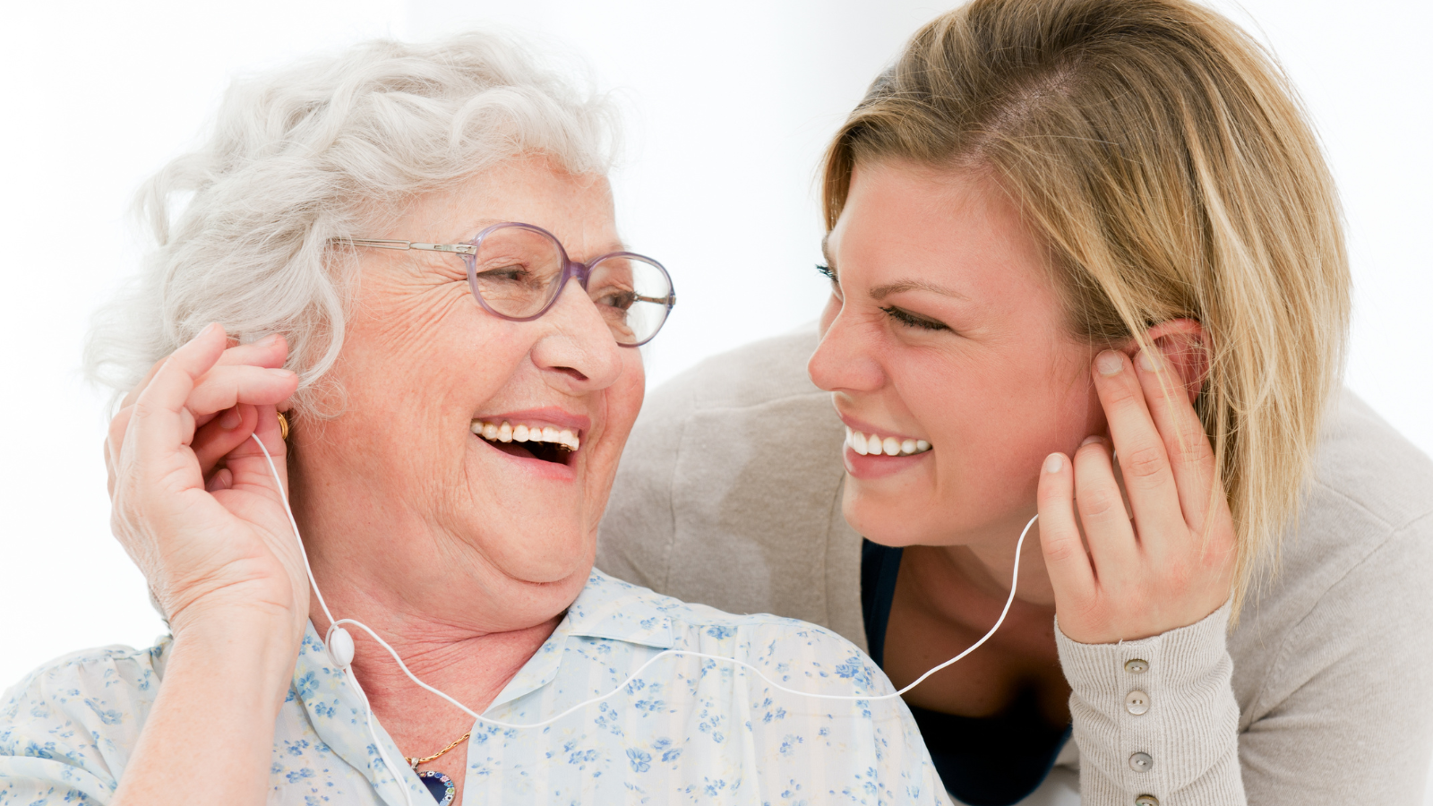 mother and daughter listening to music