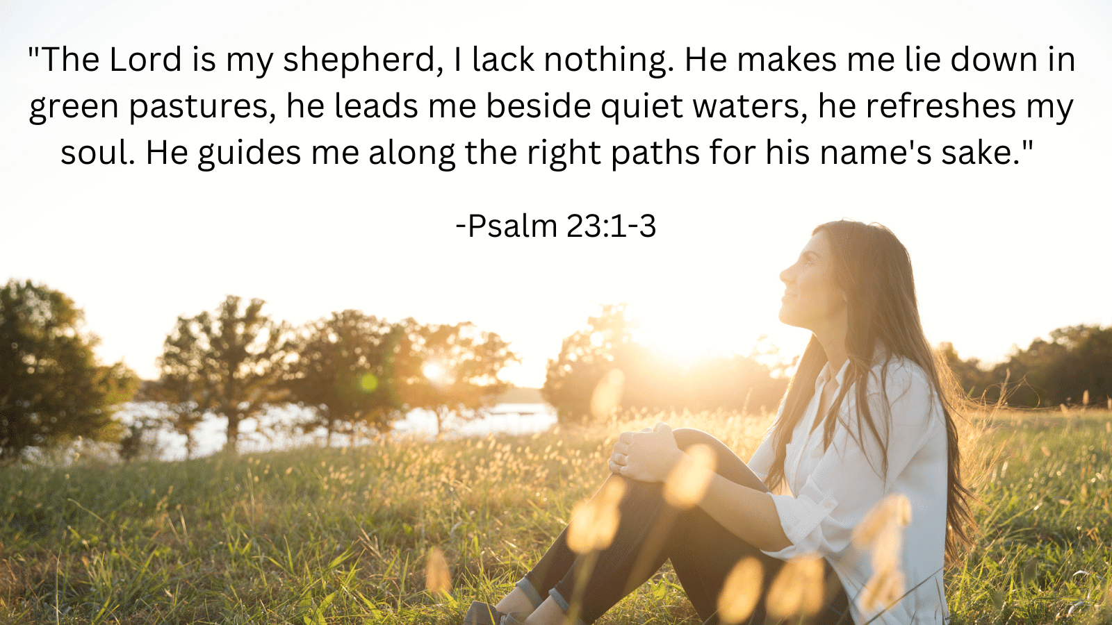 Woman sitting outside in field with Psalm 23:1-3