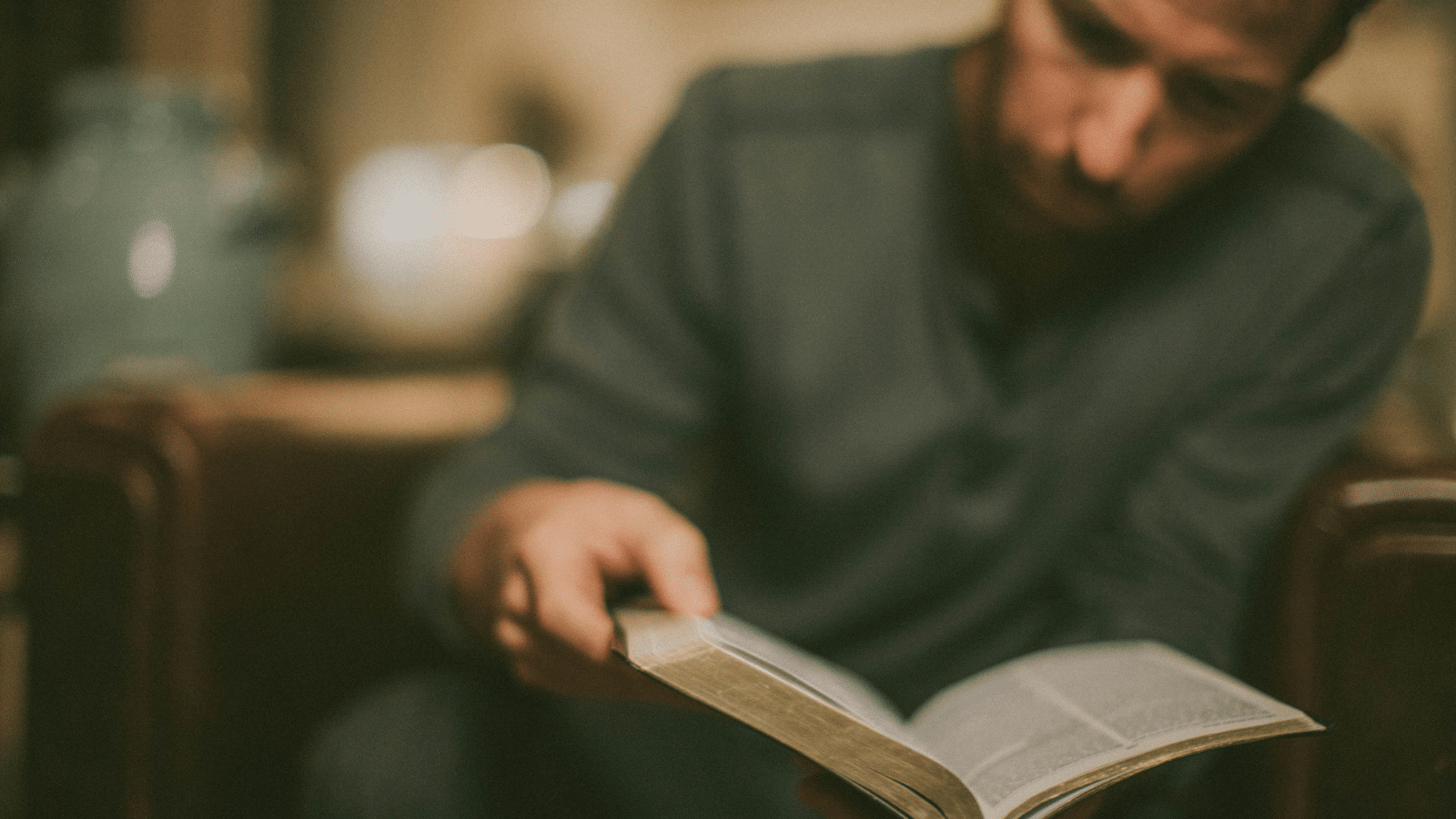 man reading bible