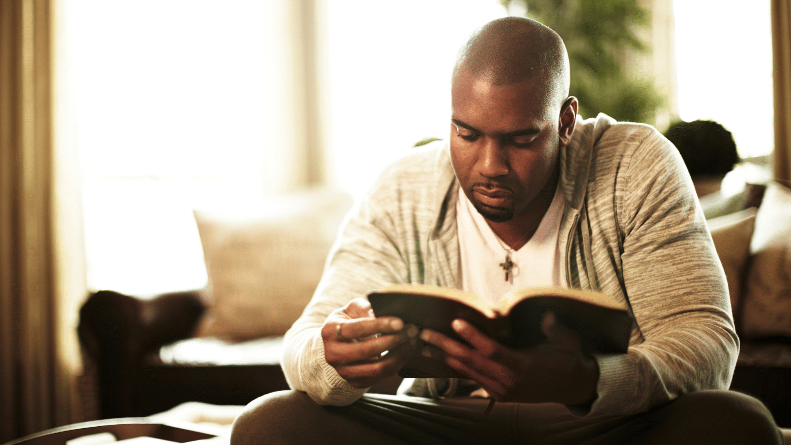 man reading the Bible