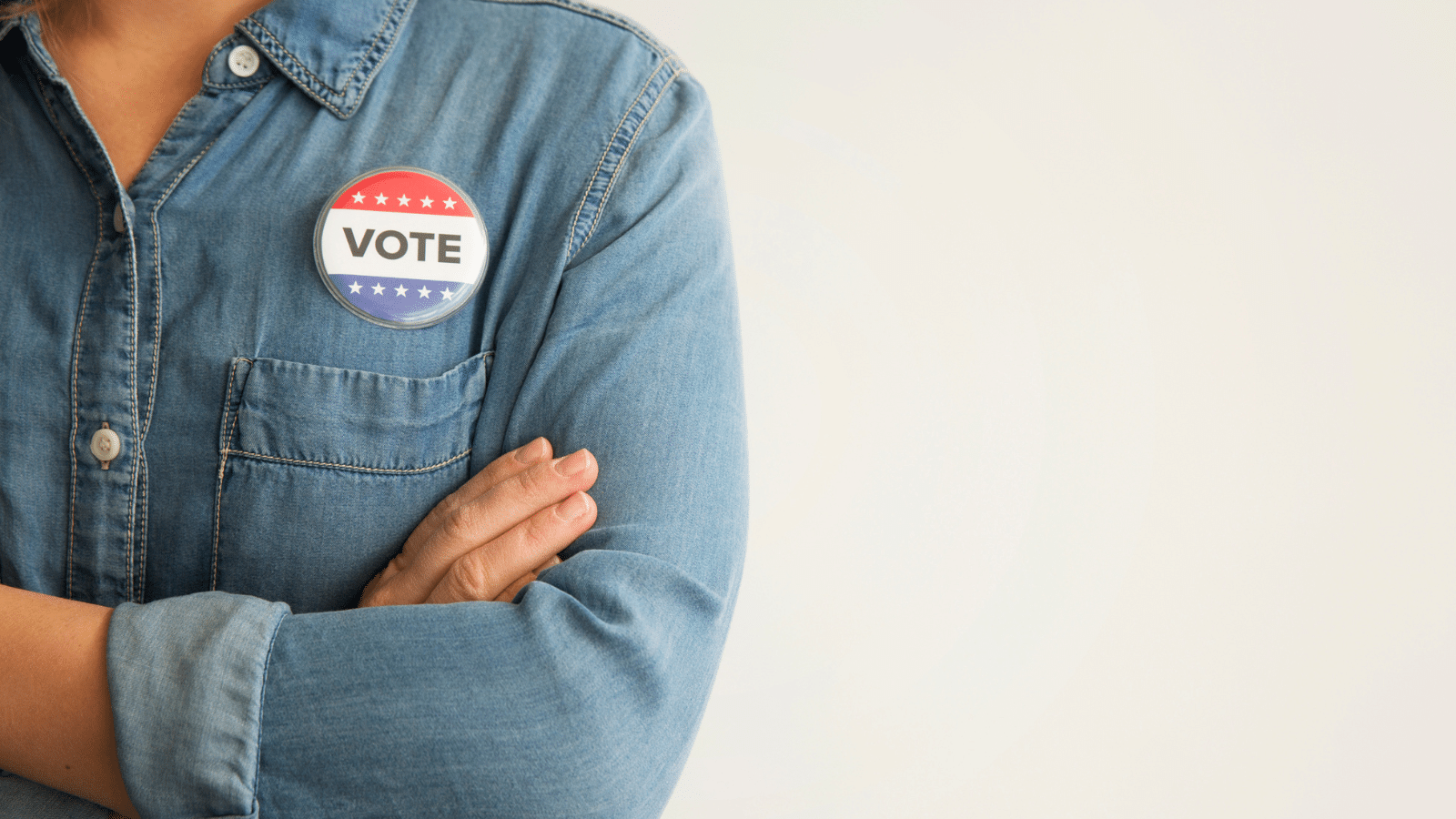 Someone wearing a shirt with an "I voted" button.