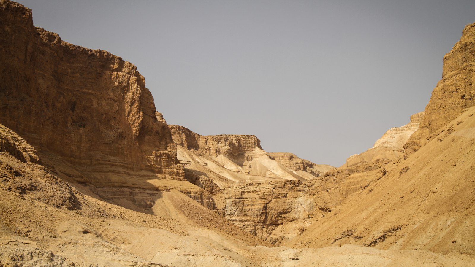 A view of the rocky cliffs of Masada, Israel.