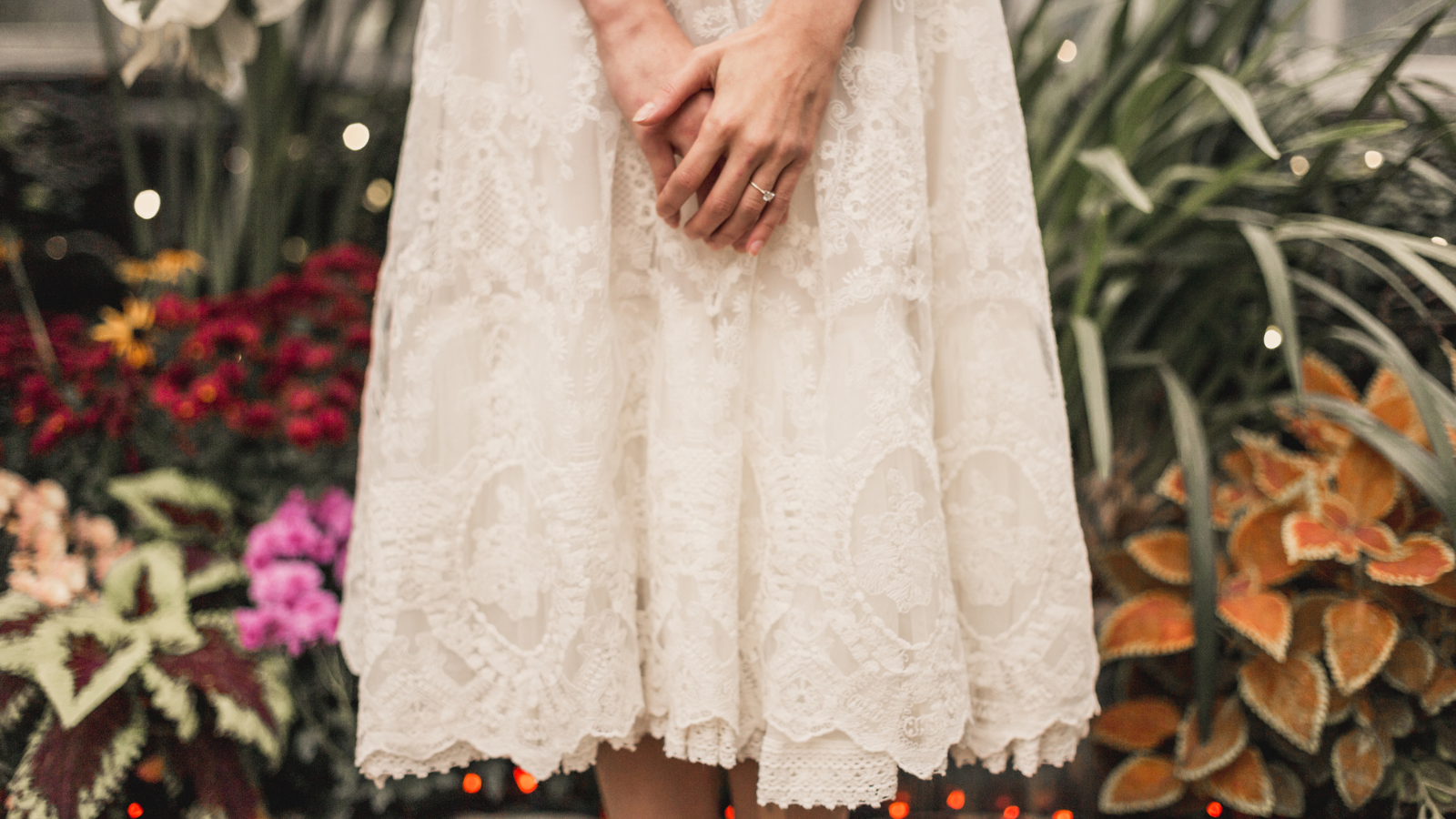 A woman in a long white skirt.
