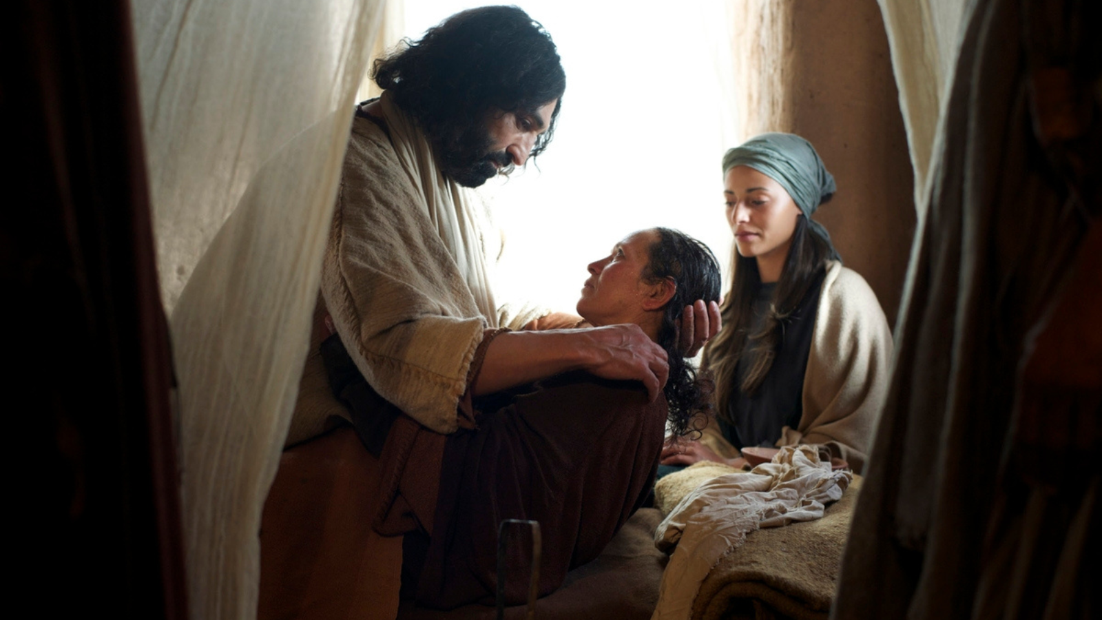 An image of jesus helping people.