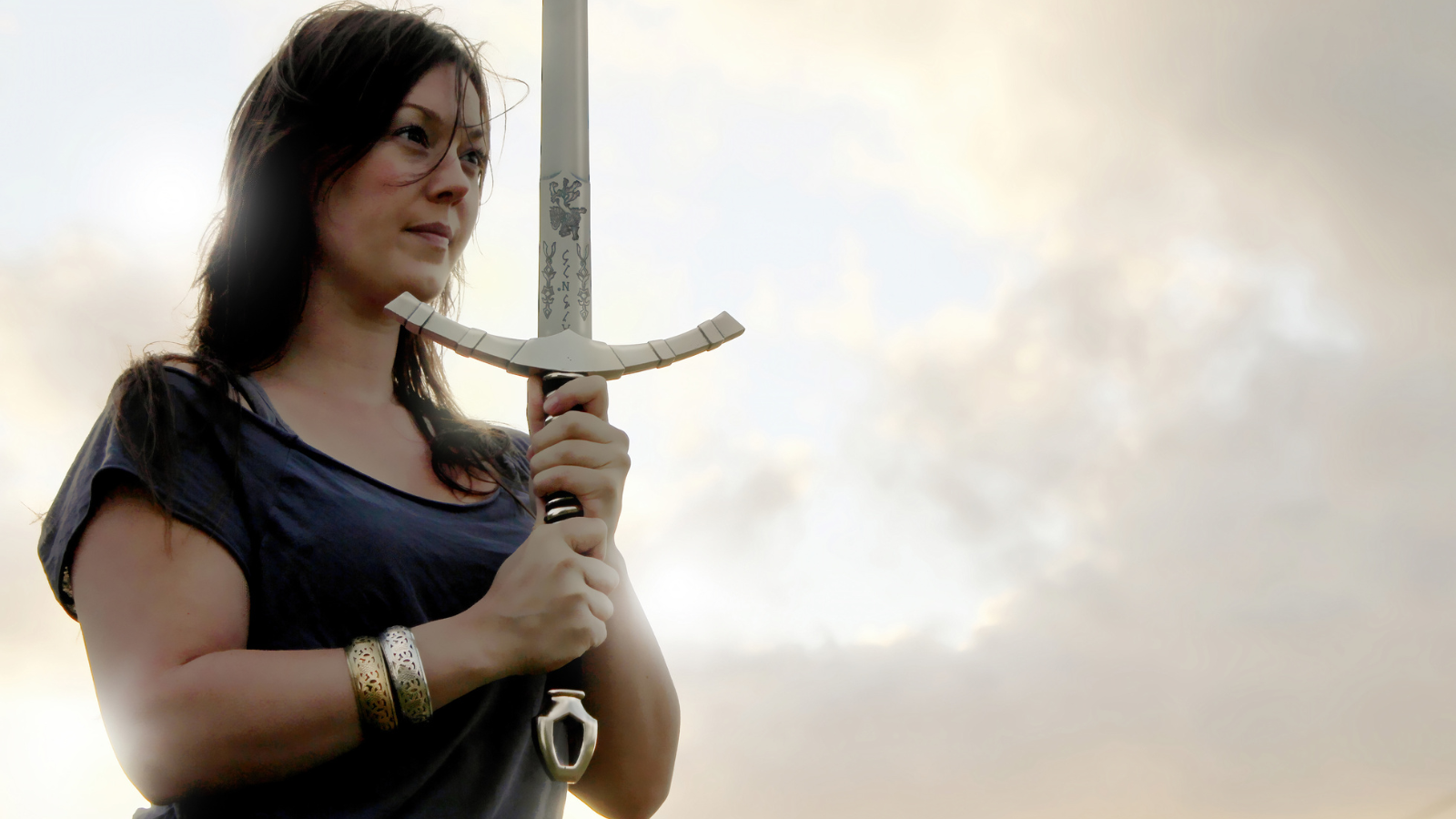 A warrior woman holding a sword.