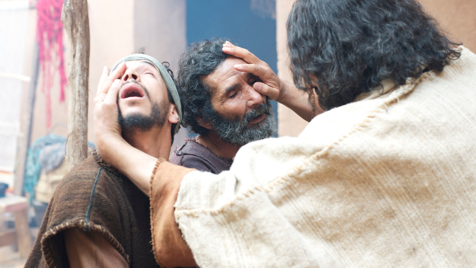 Jesus healing two men.