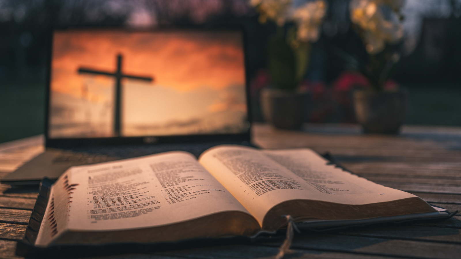 An image of a cross in front of an open bible.