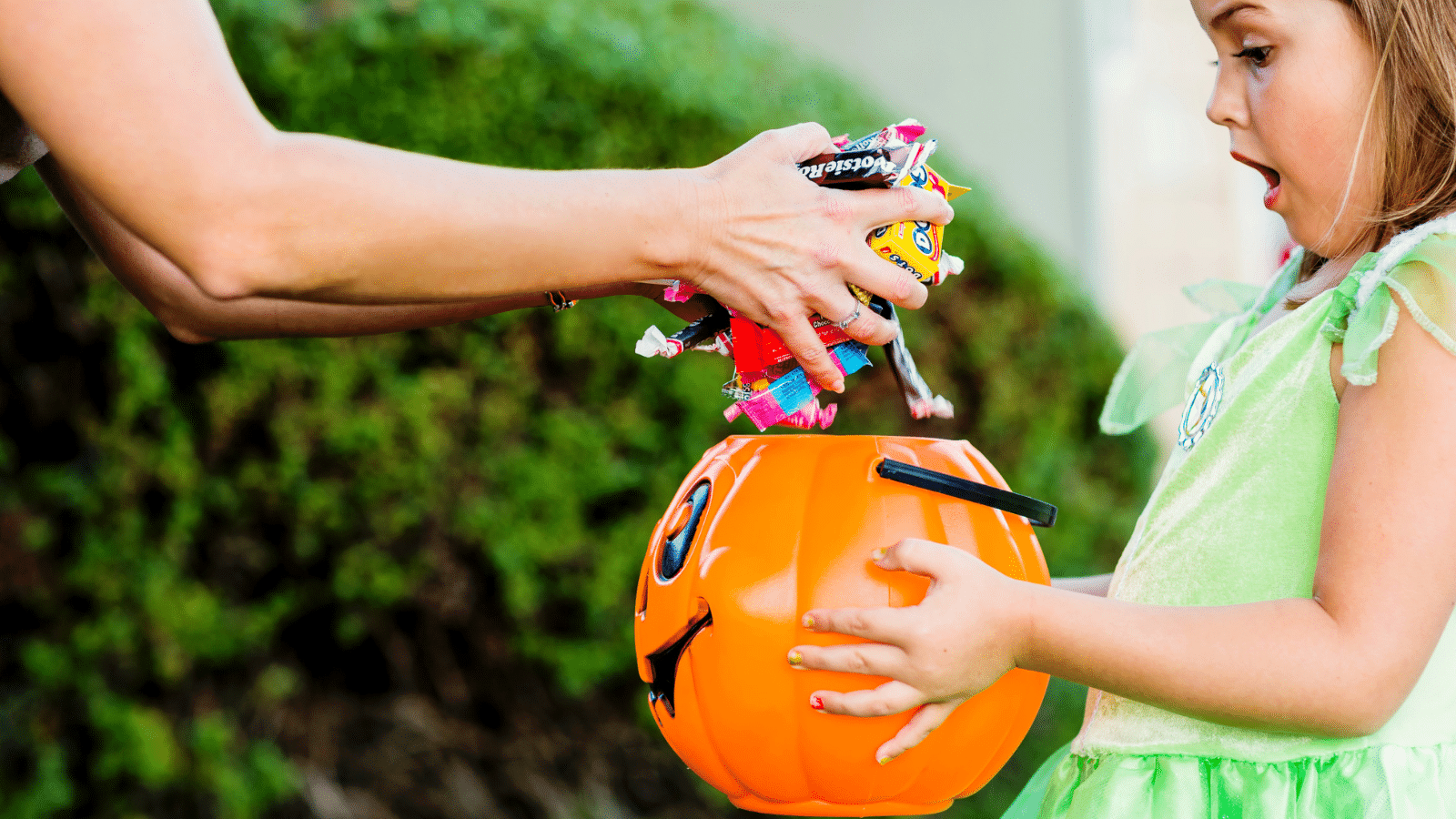 girl with candy on halloween