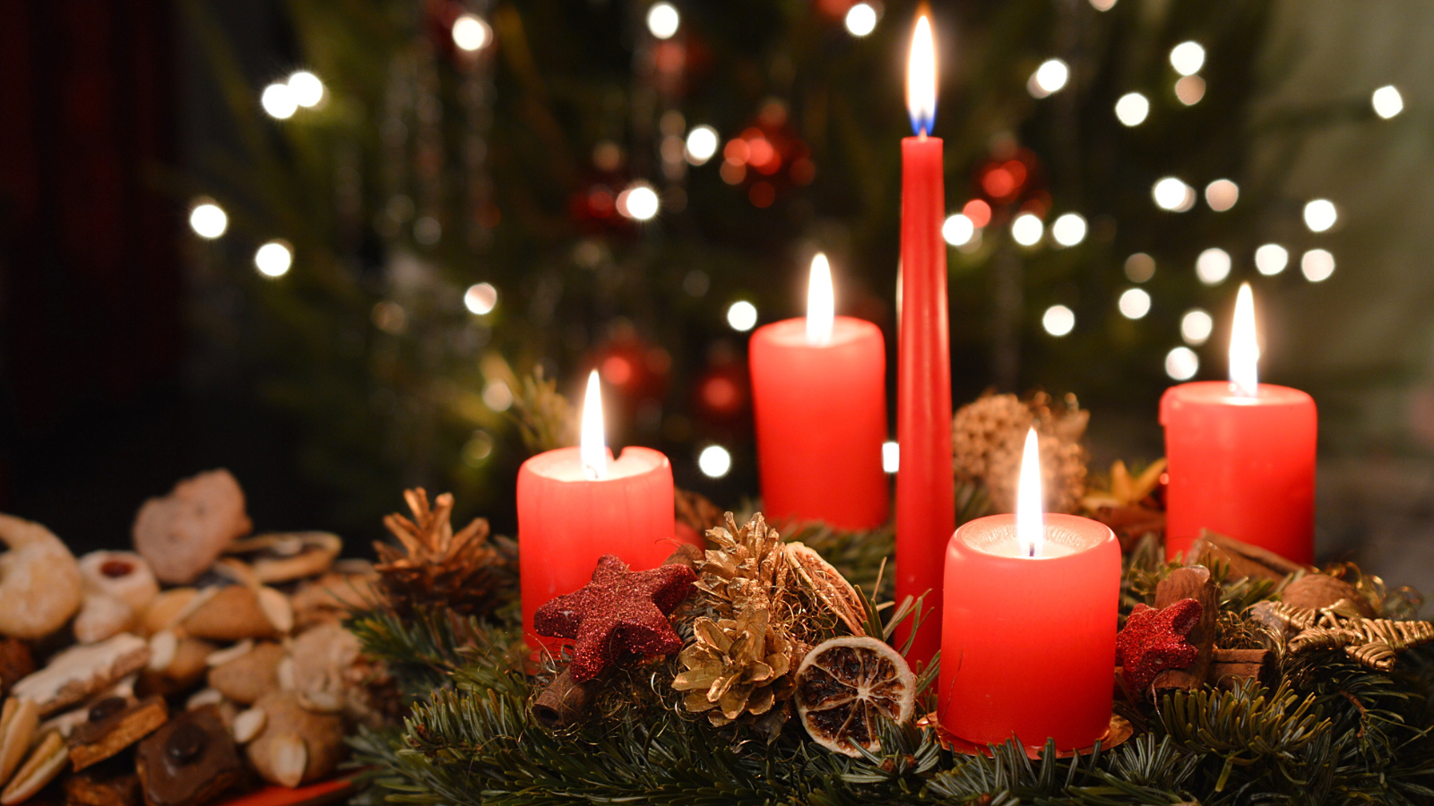 Ad advent wreath with red candles.