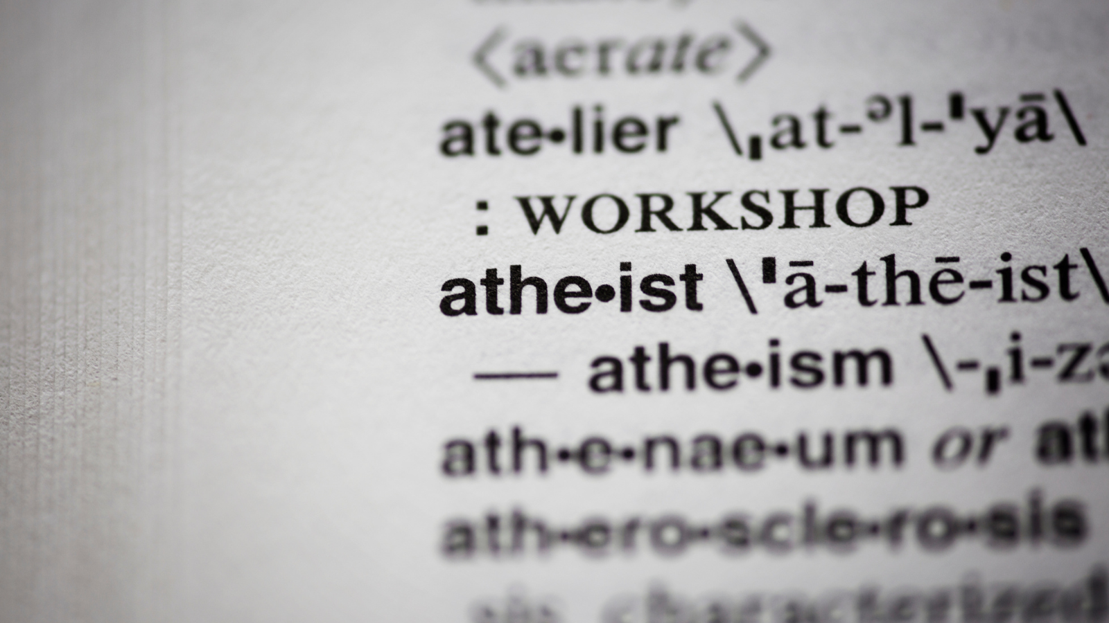 The definition of atheist on a dictionary page.