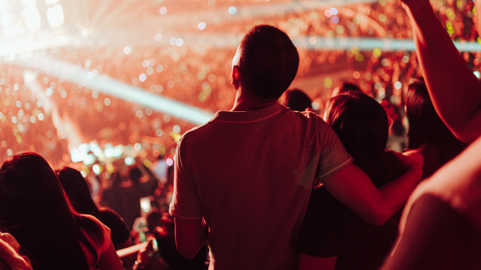 A couple at a concert together.