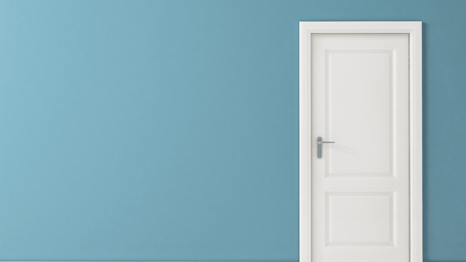 closed door with blue wall
