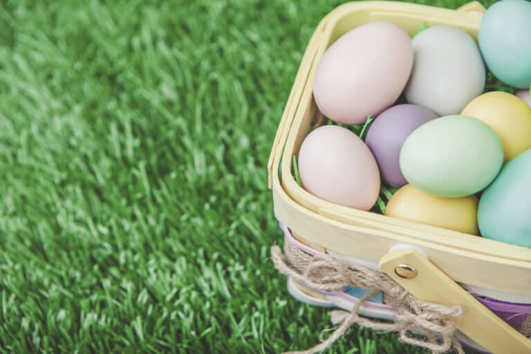 Easter basket full of colorful eggs