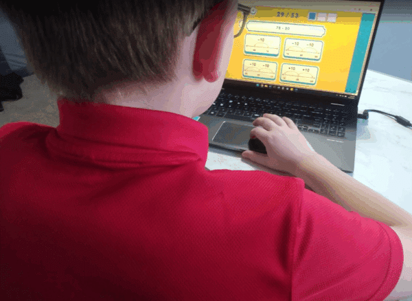 Boy taking Mathseeds placement test
