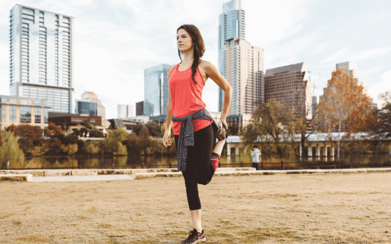 Woman running stretching